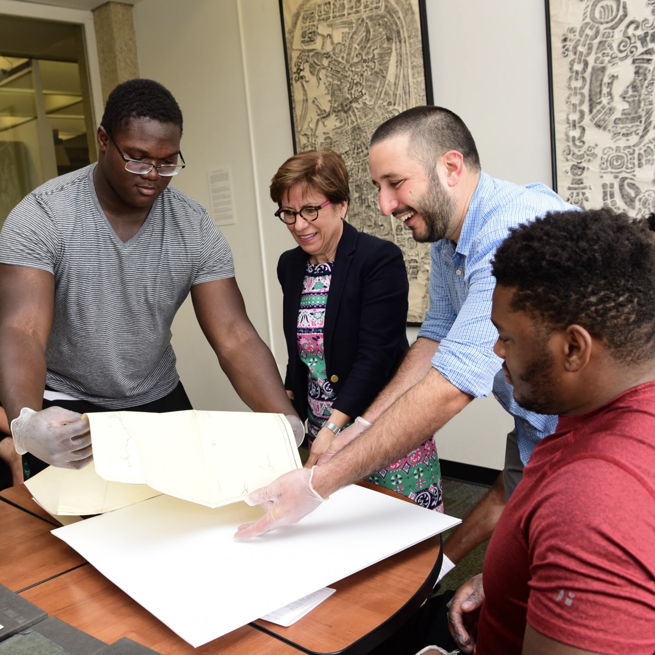 Students working with archives